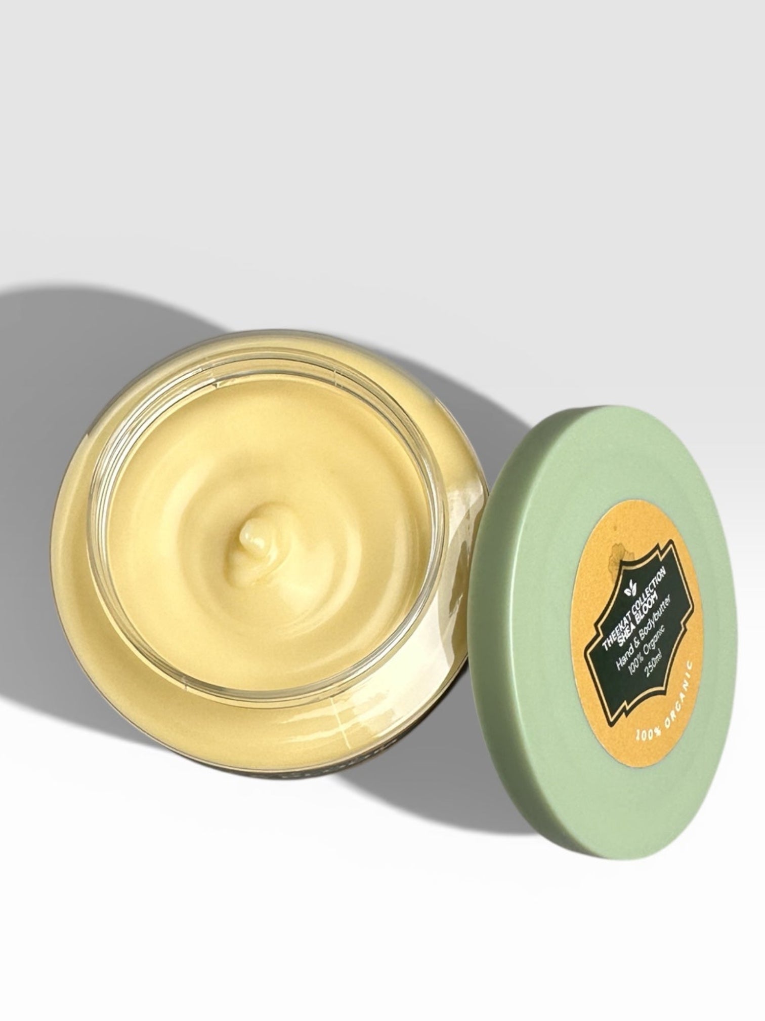 Applying whipped shea butter to dry skin for long-lasting hydration